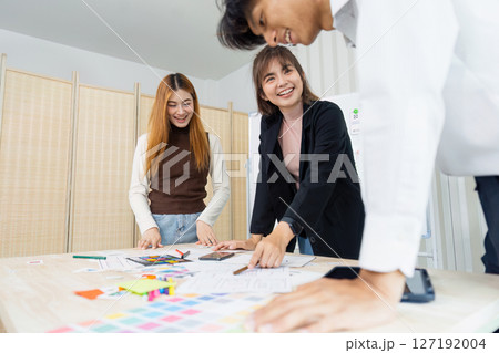 team of UI UX web designer are working together to develop mobile responsive websites with UI UX front end designer previews 127192004