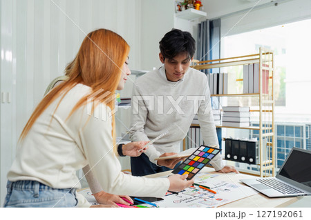 team of UI UX web designer are working together to develop mobile responsive websites with UI UX front end designer previews 127192061