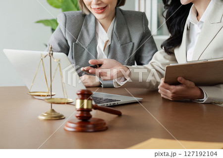 Lawyer working with client discussing contract document in office, consulting to help customer 127192104