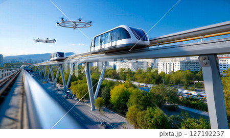 Futuristic monorail and autonomous drones navigating above a green city with modern infrastructure Futuristic monorail and autonomous drones navigating above a green city with modern infrastructure 127192237