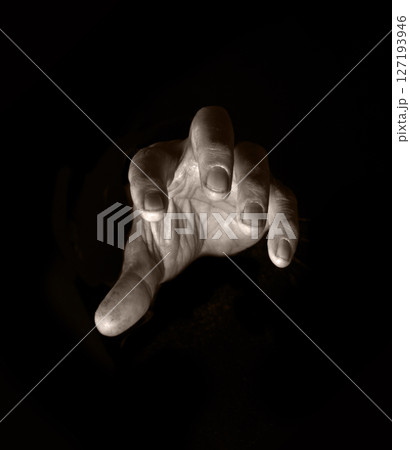 A hand is extended to take A hand is extended to take 127193946