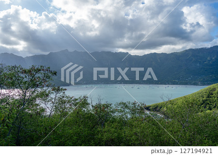 Taiohae Bay and town with anchored sailboats in Nuku Hiva, Marquesas Islands, French Polynesia Taiohae Bay and town with anchored sailboats in Nuku Hiva, Marquesas Islands, French Polynesia 127194921