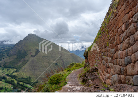 Ancient Inca ruins of Pisac nestled in the Andean mountains, Peru Ancient Inca ruins of Pisac nestled in the Andean mountains, Peru 127194933