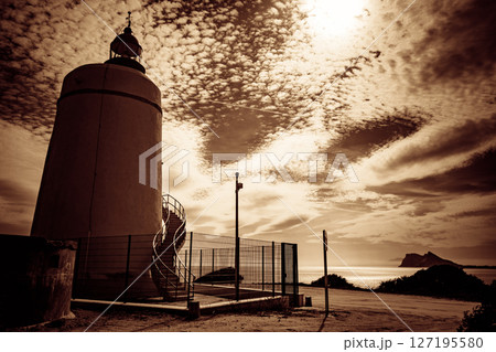 Lighthouse and Gibraltar rock, La Alcaidesa, Spain. Lighthouse and Gibraltar rock, La Alcaidesa, Spain. 127195580