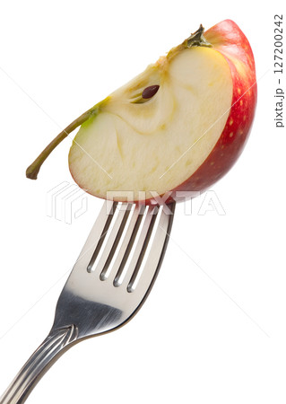 Apple slice on fork isolated on transparent background, fresh fruit snack, healthy eating concept Apple slice on fork isolated on transparent background, fresh fruit snack, healthy eating concept 127200242