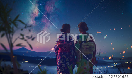 七夕の夜、星空を見上げる浴衣姿のふたり  夏の思い出と願いごと 127201688