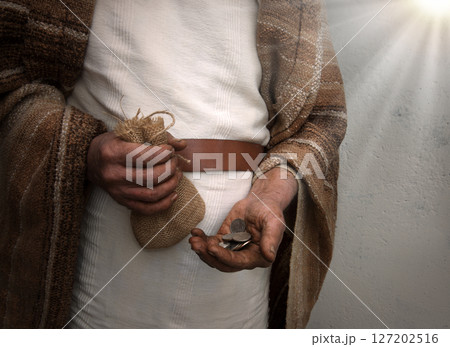 Ancient man with silver coins Ancient man with silver coins 127202516
