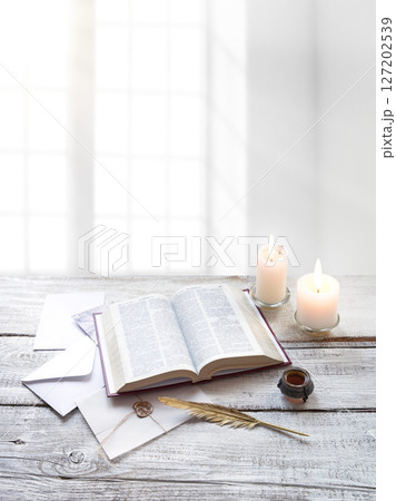 Bible on white wooden table Bible on white wooden table 127202539