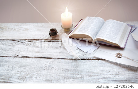 Bible on white wooden table 127202546