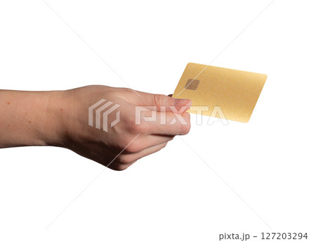 Bank card held in hand, showing a yellow and white plastic design with a chip. Customer using the 127203294