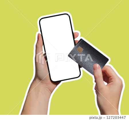 Hand holding a smartphone displaying a bank card for online payment. Mobile technology for cashless Hand holding a smartphone displaying a bank card for online payment. Mobile technology for cashless 127203447