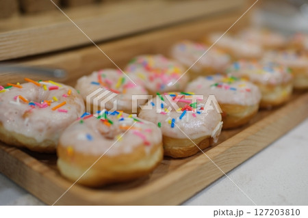 Donuts frosting sprinkles Colorful Donuts isolated on white background 127203810
