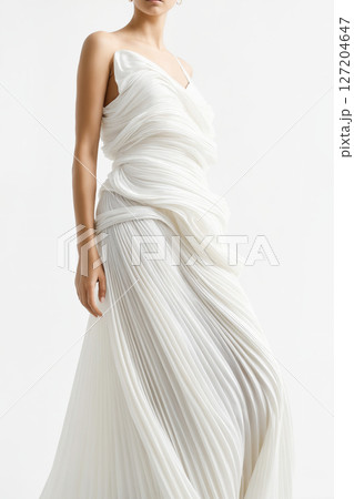 amazing beautiful white dress falling from a lovely female body 127204647