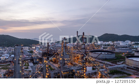 Oil and gas industrial refinery at night, Oil and gas refinery petrochemical plant pipeline steel, Oil and gas refinery factory oil and gas storage tank pipeline steel at night, Global energy refinery 127205150