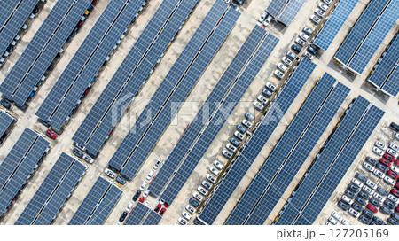 Aerial top view of car park with solar panel photovoltaic, Solar panel photovoltaic installation on roof of car parking lot, Alternative electricity source sustainable resources. Aerial top view of car park with solar panel photovoltaic, Solar panel photovoltaic installation on roof of car parking lot, Alternative electricity source sustainable resources. 127205169