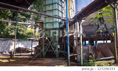 Decommissioned wood ply manufacturing plant, Industrial machineries and tools of Old Factory Facility, Rusty large industrial facilities Decommissioned wood ply manufacturing plant, Industrial machineries and tools of Old Factory Facility, Rusty large industrial facilities 127206333