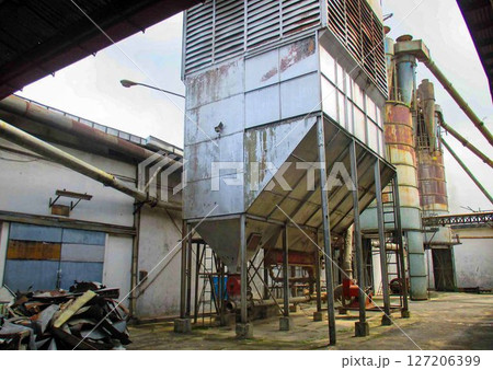 Decommissioned wood ply manufacturing plant, Industrial machineries and tools of Old Factory Facility, Rusty large industrial facilities Decommissioned wood ply manufacturing plant, Industrial machineries and tools of Old Factory Facility, Rusty large industrial facilities 127206399