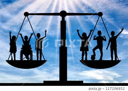 Silhouettes of Diverse Children on a Scale of Justice 127206852