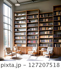 自然光差し込む静かな図書館の読書スペース 127207518