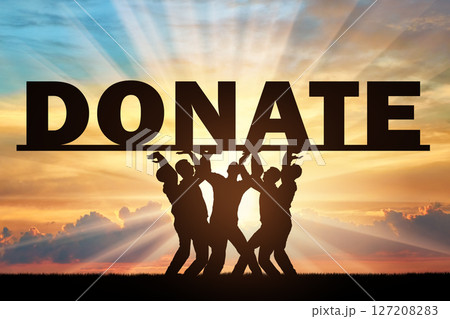 Altruism. Group of men holds the word Donate 127208283
