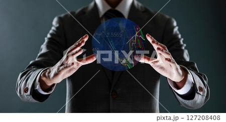 businessman with financial symbols coming from hand, stock markets concept. 127208408