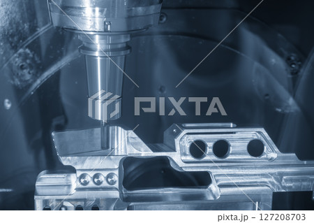 The 5-axis CNC milling machine cutting the aerospace part with solid ball end mill tool in the light blue scene. The 5-axis CNC milling machine cutting the aerospace part with solid ball end mill tool in the light blue scene. 127208703