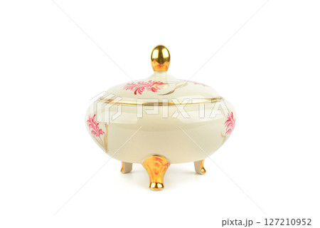 Porcelain vintage sugar bowl isolated on white. Porcelain vintage sugar bowl isolated on white. 127210952