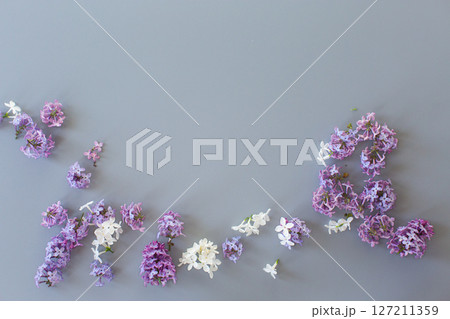 Romantic lilac bouquet on gray background 127211359