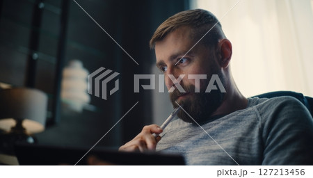 Financial Analyst, Businessman Talking on Phone, Working on Tablet Computer, Monitoring Real-Time Stocks Financial Analyst, Businessman Talking on Phone, Working on Tablet Computer, Monitoring Real-Time Stocks 127213456