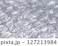 Bubble wrap macro photo with selective focus. 127213984