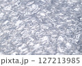 Bubble wrap macro photo with selective focus. 127213985