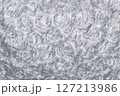 Bubble wrap macro photo with selective focus. 127213986