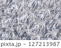 Bubble wrap macro photo with selective focus. 127213987