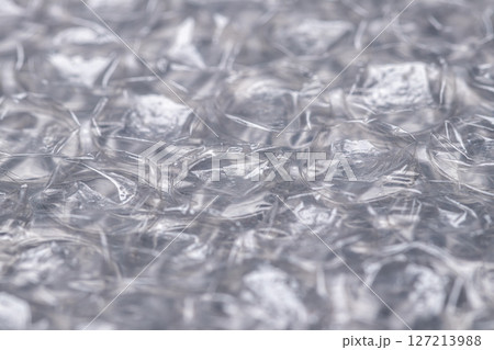 Bubble wrap macro photo with selective focus. Bubble wrap macro photo with selective focus. 127213988