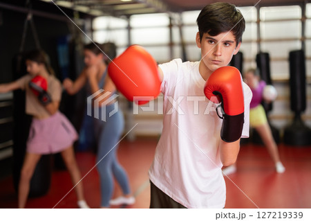 Teenage boy during workout 127219339
