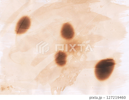 Vintage colored of old paper background with thermal burn marks. Vintage colored of old paper background with thermal burn marks. 127219460