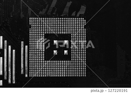 Old black motherboard of computer equipment focusing on CPU slot background, Technology background. Old black motherboard of computer equipment focusing on CPU slot background, Technology background. 127220191