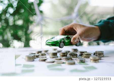 ESG strategies are driving business growth, boosting revenue and financial success by aligning economic goals with sustainable finance. growth, revenue, finance, economic, financial. green car ESG strategies are driving business growth, boosting revenue and financial success by aligning economic goals with sustainable finance. growth, revenue, finance, economic, financial. green car 127223553