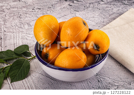 Ripe sweet juicy medlar fruit 127228122