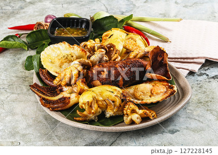 Asian grilled seafood mix plate Asian grilled seafood mix plate 127228145