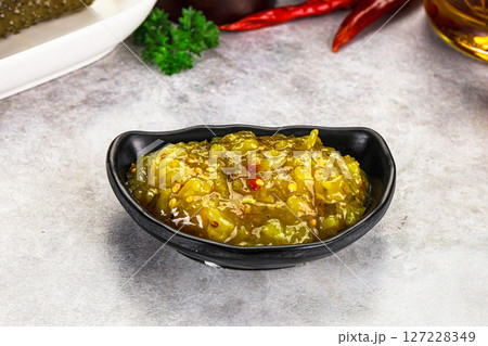 Souce gherkin relish with marinated cucumbers 127228349