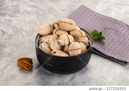 Crunchy pecan nut in the bowl 127228353