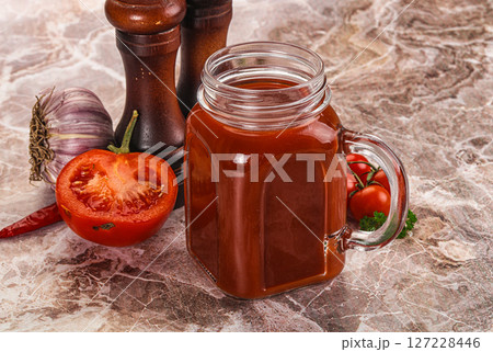 Fresh tomato juice in the glass Fresh tomato juice in the glass 127228446