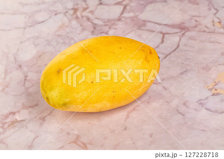 Ripe sweet yellow juicy Mango 127228718