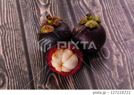 Ripe sweet juicy tropical mangosteen 127228722