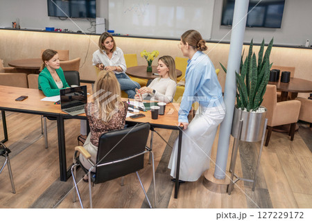 Teamwork Meeting Women brainstorm ideas in office at daytime to solve issues. Teamwork Meeting Women brainstorm ideas in office at daytime to solve issues. 127229172