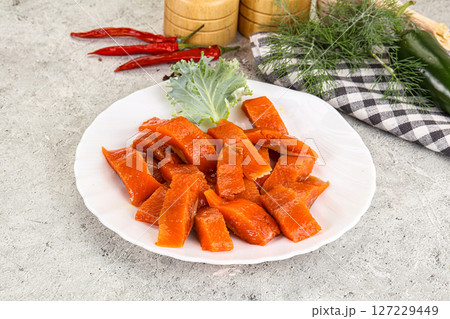 Red pickled herring fish fillet Red pickled herring fish fillet 127229449