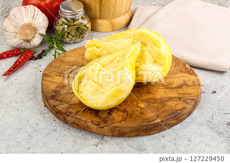 Italian traditional yellow Scamorza cheese Italian traditional yellow Scamorza cheese 127229450