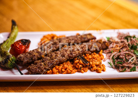 Turkish adana kebab with vegetables 127229823