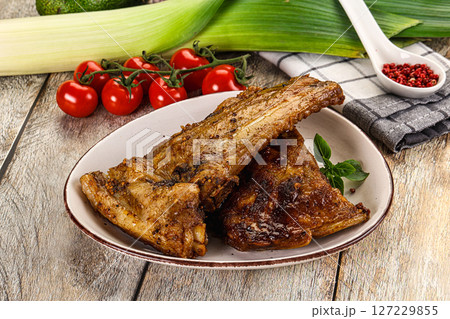 Tasty roasted pork ribs with spices Tasty roasted pork ribs with spices 127229855